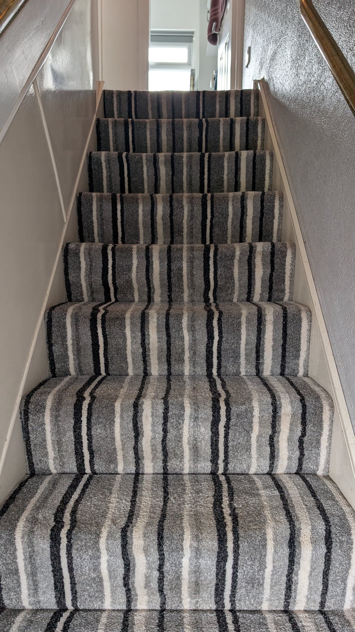 Staircase carpet after cleaning — full staircase view